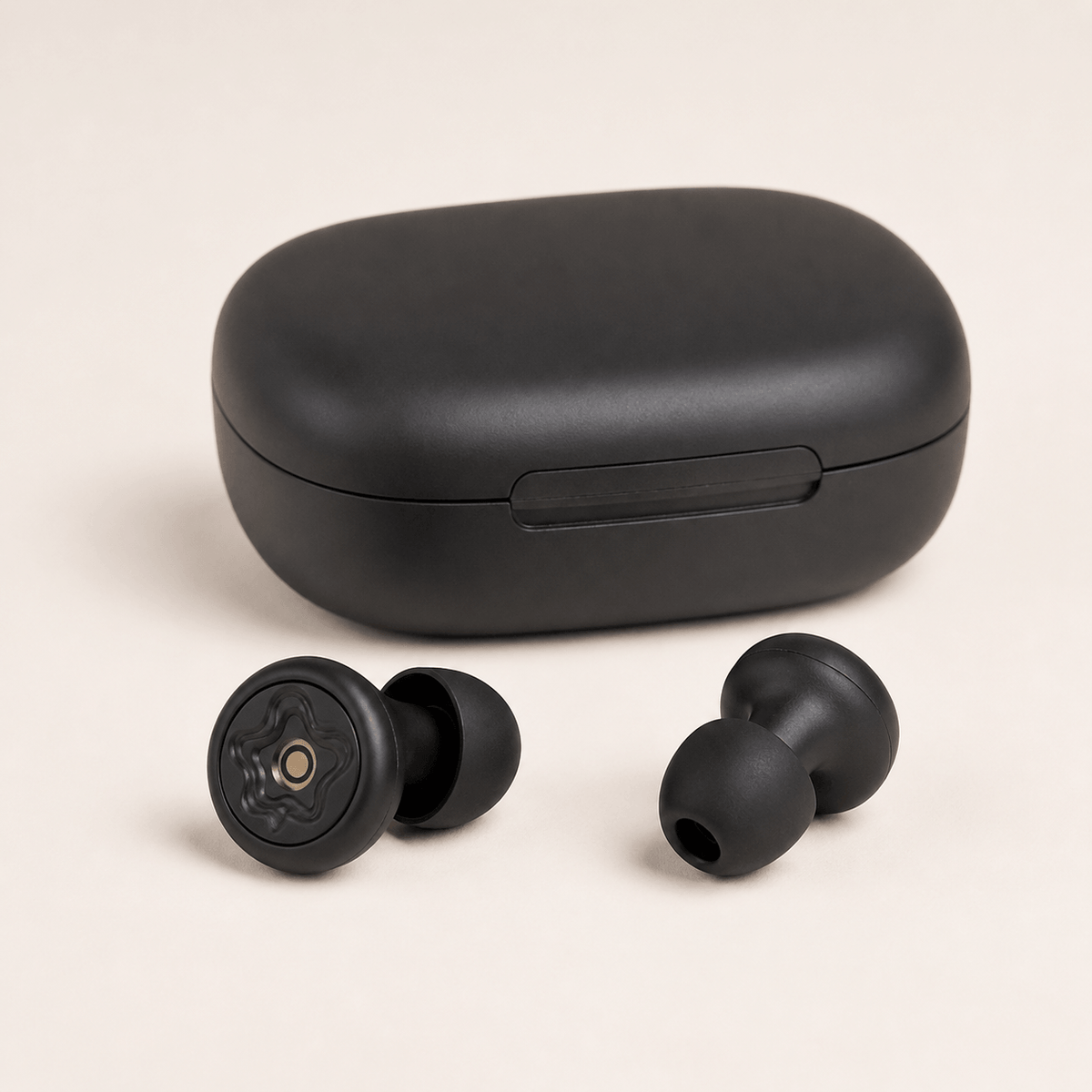 Black TUCK Plugs motorcycle earplugs beside their matte black carry case